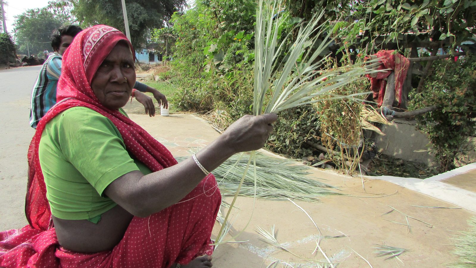 A woman at her livelihood craft