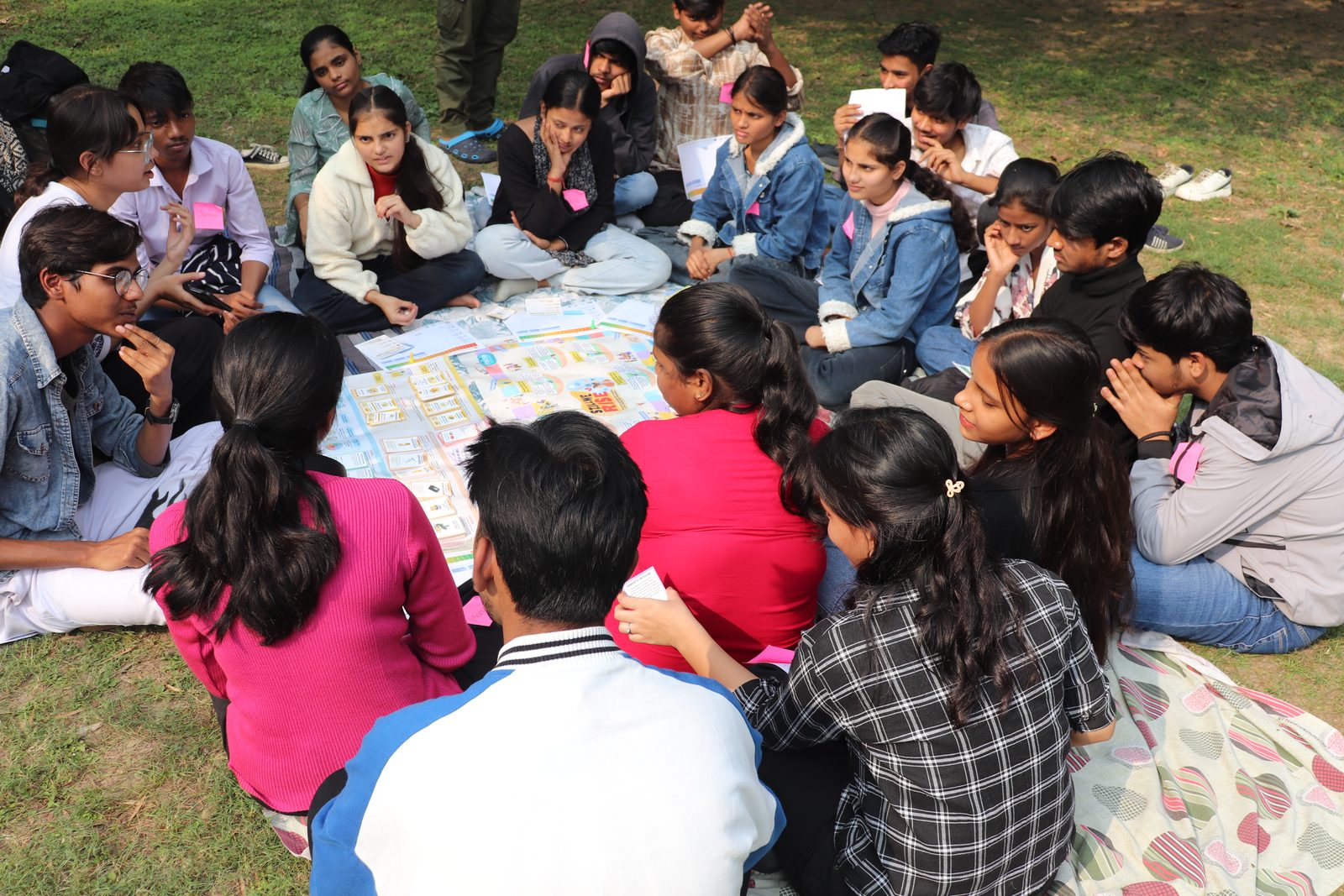 Young people playing the RISE board game